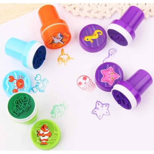10 Pcs/set cute stamp toy cartoon dinosaur animal marine life encourage pattern round plastic DIY toy seal with box for kids
