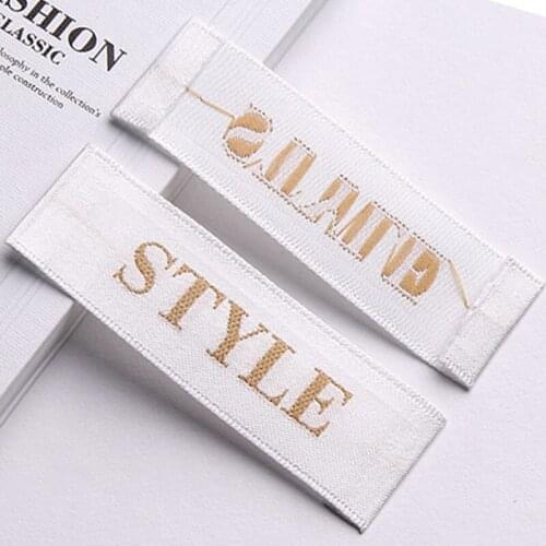 WoodenShuttleMachineKnittedEdgeGarmentAccessoriesLoopFoldClothingLabelsCustomizedLogoWovenLabelsFabricForCollarMaterialSoftComfo