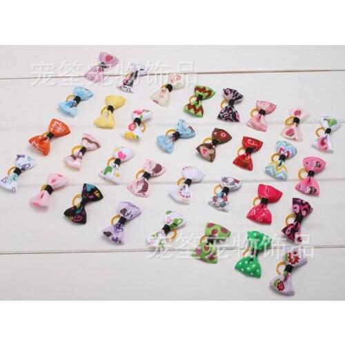 Pet dog and butterfly rubber accessories capitatum Pet accessoires Dog Bow Accessories 100pcs