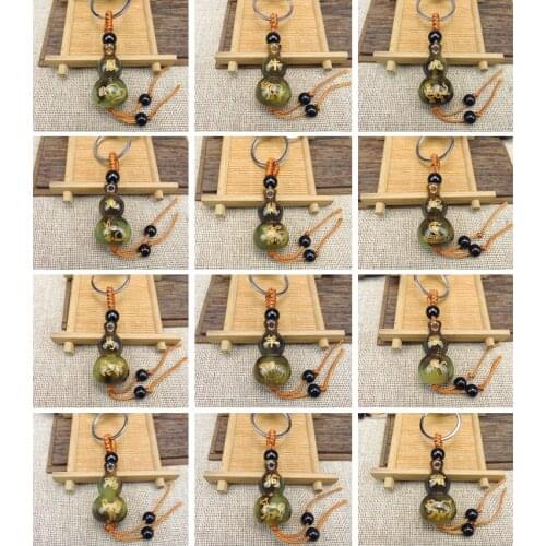 Chinese Zodiac Imitation Ox Horn Gourd Key Buckle Pendant Hot Selling Gold-color Lettering Chinoiserie Gift Pendant Wholesale