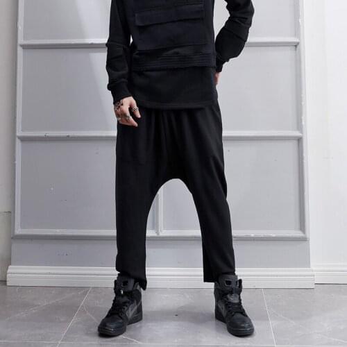Japanese simple and loose crotch pants spring and summer tide mens dark black stretch show thin sports black leisure Harlem pan
