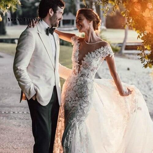 Romantic Ball Gown Wedding Dresses 2021 Off The Shoulder Bridal Gown Backless Scoop Chapel Train Applique White Plus Size Bride