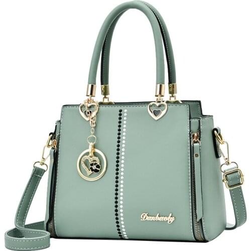 2021 New ladies atmospheric fashion sense one-shoulder stiletto bag Casual Tassel Letter Shoulder Bags