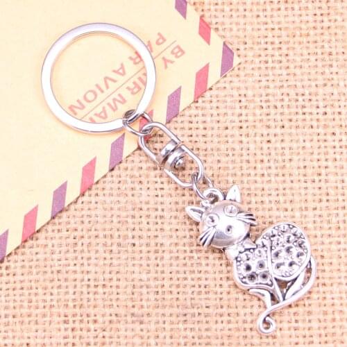 New Fashion Keychain 36x23mm capuchin cat Pendants DIY Men Jewelry Car Key Chain Ring Holder Souvenir For Gift