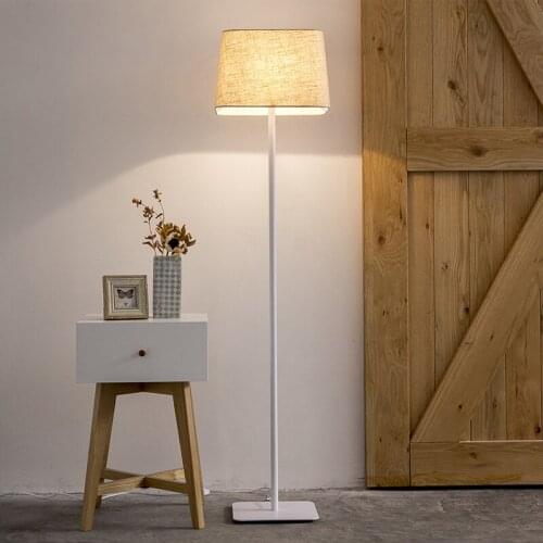 Living room sofa floor lamp simple and modern art lamp vertical table lamp minimalist Nordic bedroom bedside creativity