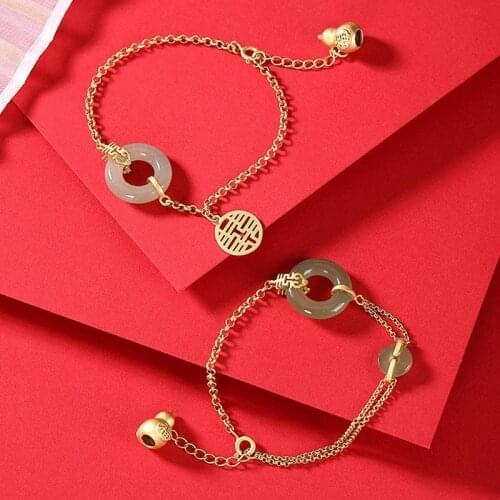 Original design natural Hetian jade safe buckle gourd bracelet Chinese retro creative charm womens silver jewelry