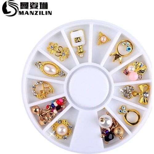 Hot nail wheel accessories wholesale jewelry metal alloy disc 12 bowknot pearl