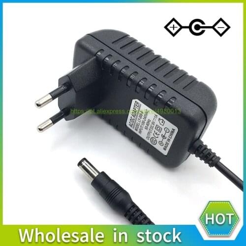 1PCS High quality AC/DC 9V 1A Switching Power Supply adapter Reverse Polarity Negative Inside EU US AU UK 5.5mm x 2.1mm-2.5mm
