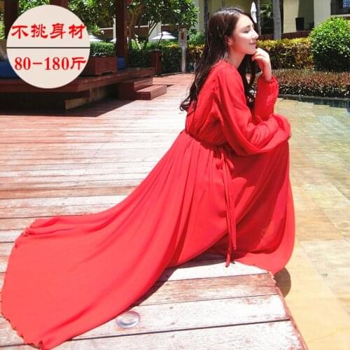 A beach chiffon dress, a large bohemian seaside holiday dress, a long sleeved dress, plain, thin.maxi dresses