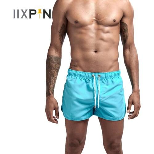 Mens Fashion Beach Shorts Quick-drying Solid Color Sportswear Elastic Waistband with adjustable Drawstring Three-point Shorts