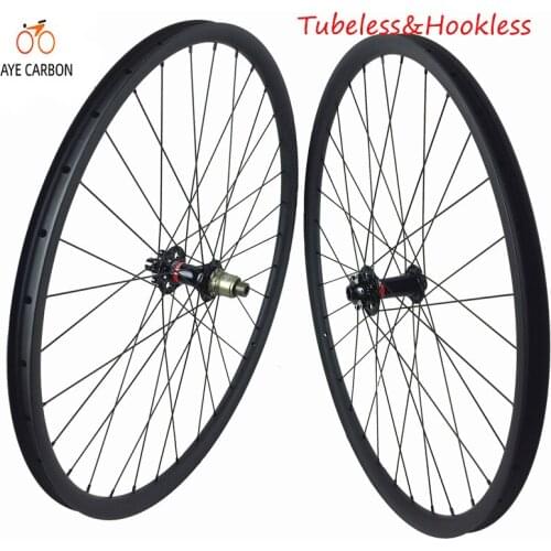 Hot sale 29er carbon fiber MTB wheels 27mm width asymmetric rims for XC mountain bicycle with novatec boost hubs