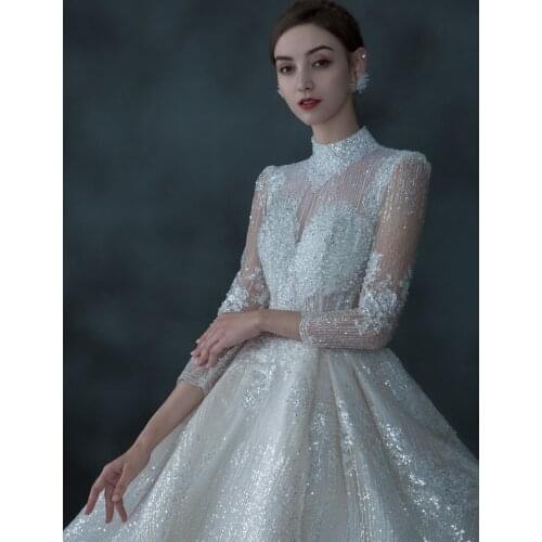 Luxury Shiny Wedding Dresses Dubai High Neck 3/4 Sleeves 2021 Sexy Backless Sparkly Sequined Crystal Formal Bridal Gowns Custom