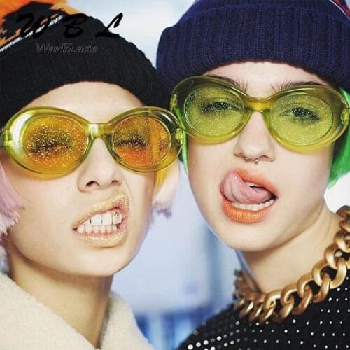 WarBLade 2019 Hot New Brand Flash Lens Oval Sunglasses Women Candy Color Cool Sexy Cute Red Yellow Pink Sun Glasses Clear Frame