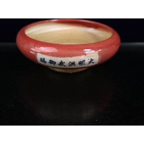 Brush washing of red glaze of old porcelain in early China