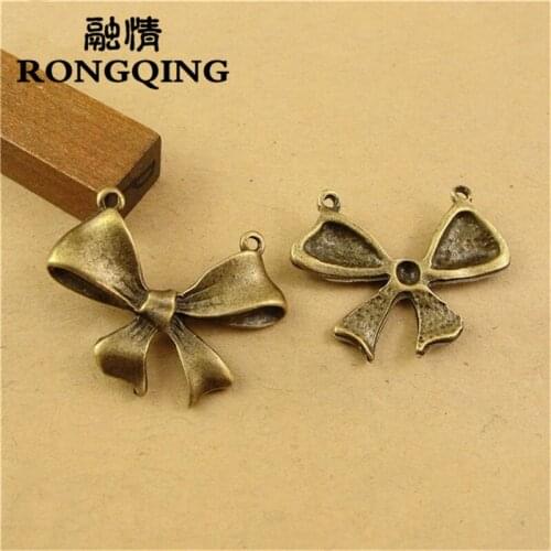 RONGQING 60pcs/lot 22*30MM Bow tie Bronze connection Charms handmade Craft pendant making fit DIY for bracelet necklace