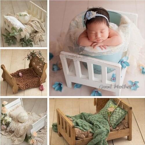 Classic wooden bed newborn baby photo studio as an old retro container newborn photography props
