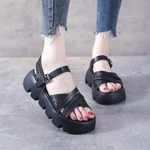 The first layer of cowhide womens shoes 2021 summer new word with thick bottom sponge cake net red hollow black sandals women