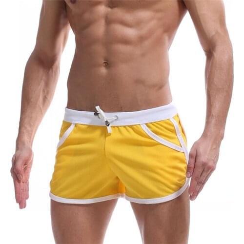Summer Beach wear new men sports Board shorts fashion man and women casual shorts thin Arrow pants