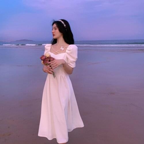 White Temperament French Dress Super Fairy Bowknot Dress Seaside Vacation Summer Gentle Wind Puff Sleeve Beach Skirt Long Skirt