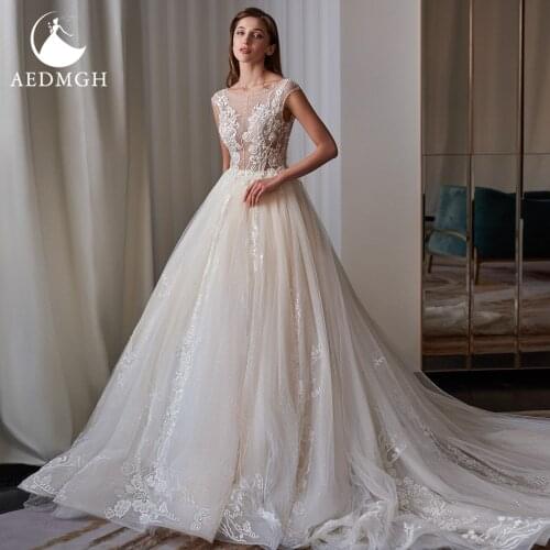 Aedmgh A-Line Wedding Dresses 2021 O-Neck Cap Sleeve Robe De Mariage Charming Lace Appliques Sequined Shiny Vestido De Novia