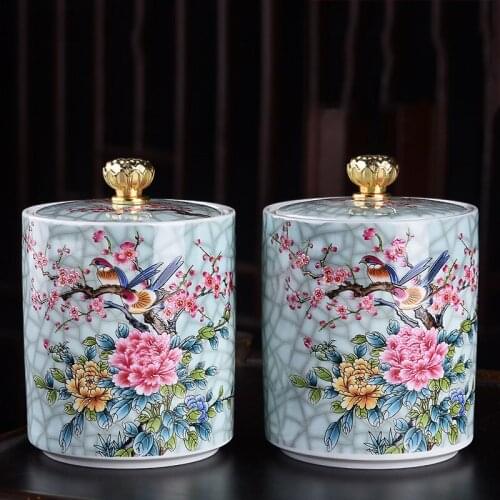 Painted flowers and birds at home, ganoderma lucidum tea, coffee beans,biscuits,candy,sealed cans,powdered ceramic storage tanks