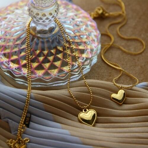 Titanium steel 18K gold-colored wheat spike love simple ins small peach heart collarbone chain short money chain female gift