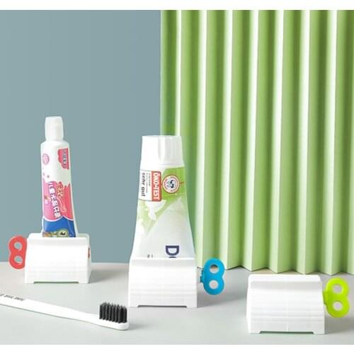 New Bathroom Accessories Toothpaste Squeezer Tooth Paste Dispenser Tube Squeezer Facial Cleanser Press Rolling Holder for Kids