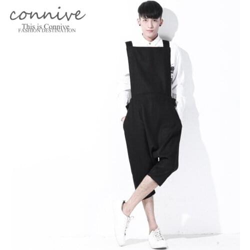 2016 Autumn mens new one piece pants black bib pants male personality loose spaghetti strap jumpsuit singer costumes