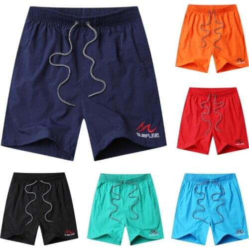 Sports shorts mens trend five-point pants beach pants solid color summer casual shorts plus size fat guy mens swimming shorts
