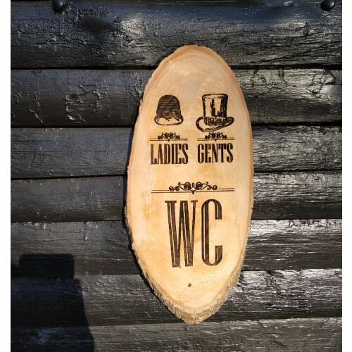 Natural Tree Laser On Burning WC Sign