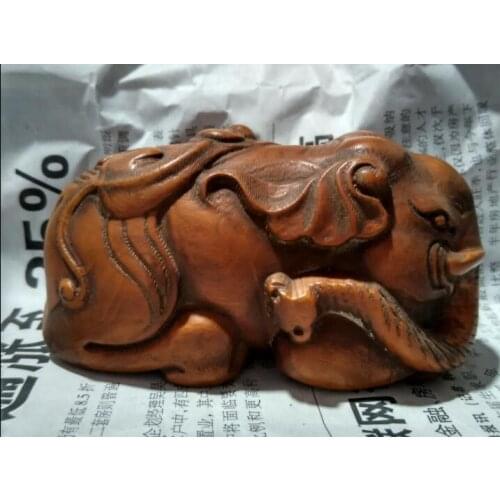 China boxwood carving mascot peace elephant statue