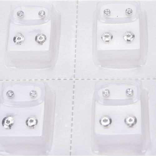 New wholesale 12 Pairs Alloy Disposable Safe Ear Stud Piercing Gun Piercer Tool Earring Piercing Jewelry Silver color