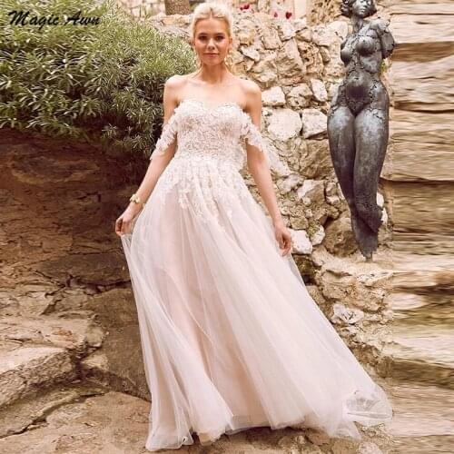 Magic Awn 2021 Beach Off The Shoulder Wedding Dresses Lace Appliques Princess Boho Bridal Gowns A-Line Customized Vestidos Novia