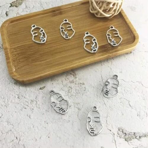 NEW Fashion Simple Abstract Hollow Human Face Zinc Alloy Jewelry DIY Handmade Accessories Earrings Headdress Pendant Wholesals