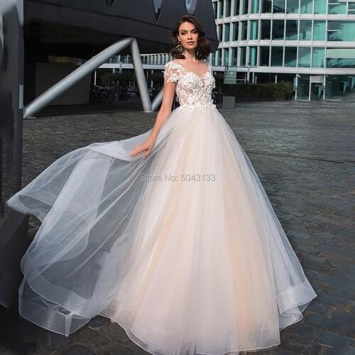 A Line Scoop Lace Appliques Wedding Dresses with Short Sleeves Backless Floor Length Tulle Bride Gowns Robe de Mariee 2021