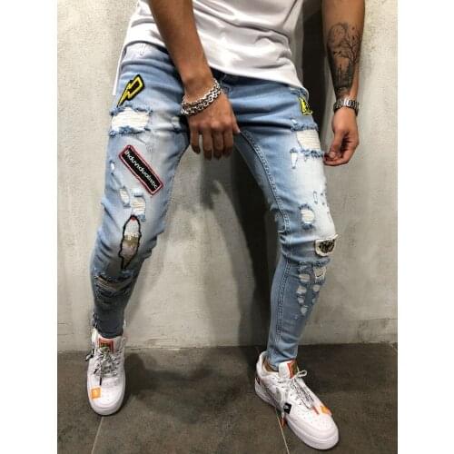 Europe and the United States explosions men hip-hop high-end tight slim hole pants new men badge slim jeans