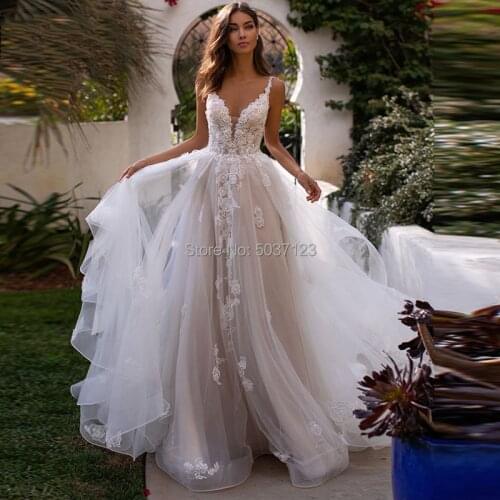 A Line Wedding Dresses Tulle Lace Appliques V-Neck Sleeveless Spaghetti Straps Backless Long Train Bridal Gown Vestido De Noiva