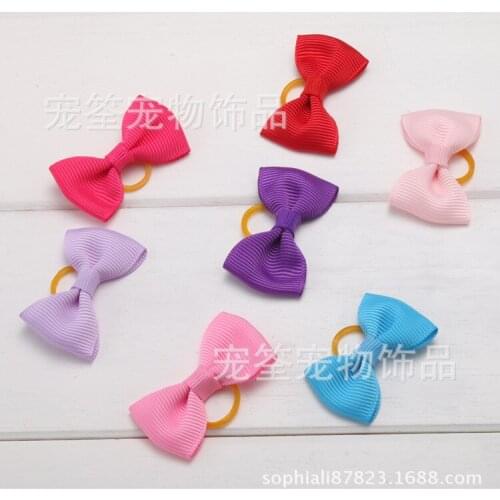 Pet dog and cat butterfly rubber accessories pet accessories pet grooming 100pcs