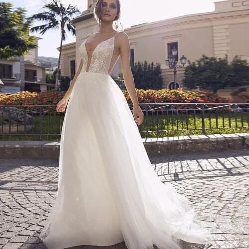 2021 Sexy Beach Wedding Dresses Spaghetti Straps V Neck A Line Tulle Appliques Bohemian Beach Boho Bridal Gowns