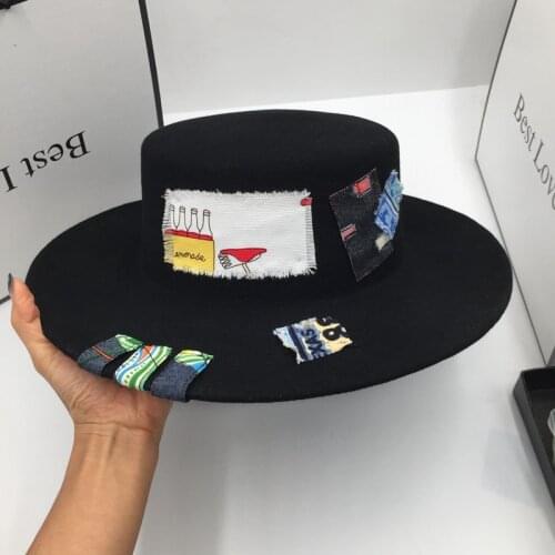 New winter fedoras wool that Europe and the United States designer duds flat brim hat for women fashion ins wind patch