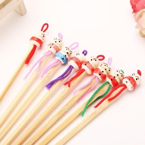 10pcs/lot Cartoons Cute Mini Doll Ear Picks Wood Bamboo Ear Picks Wax Remover Cleaner Ear Care Tool Random Color Hot Selling
