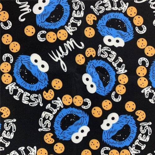 Sesame Street Black Cookie Monster Polyester Cotton Fabric for baby shirt Hometextile Mask Slipcover Cushion Mask DIY Material
