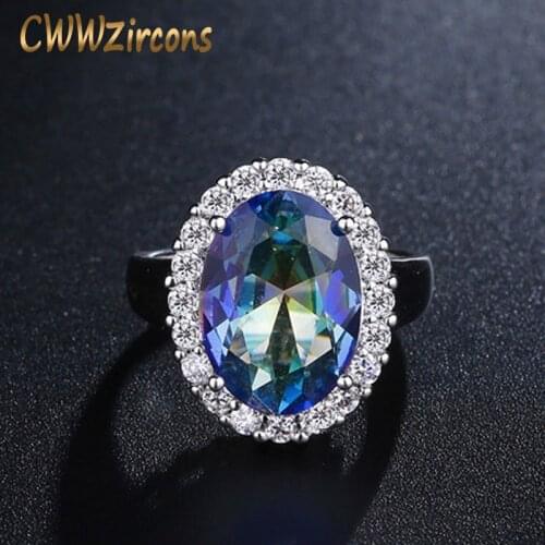 CWWZircons Top Quality Big Oval Cut Light Blue Mystical Rainbow Fire Crystal Wedding Band Ring Jewelry for Women R100