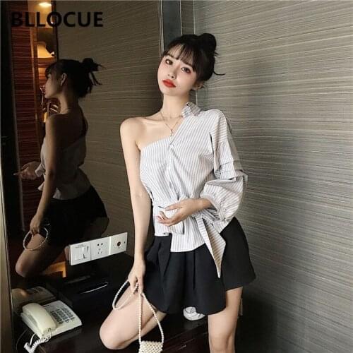 BLLOCUE New Two-Piece Women Single Sleeve Diagonal Shoulder Strap Irregular Stripe Single Breasted Top Black Mini Pleated Skirt