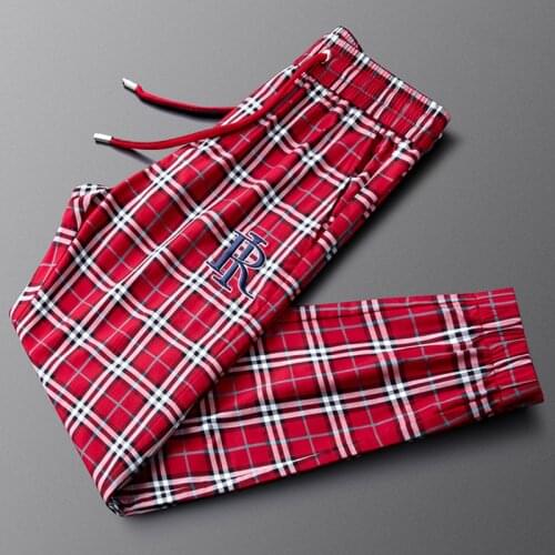 Light luxury high-end red fashion casual pants, mens sports trend, mens girdled feet, checked knitted trousers