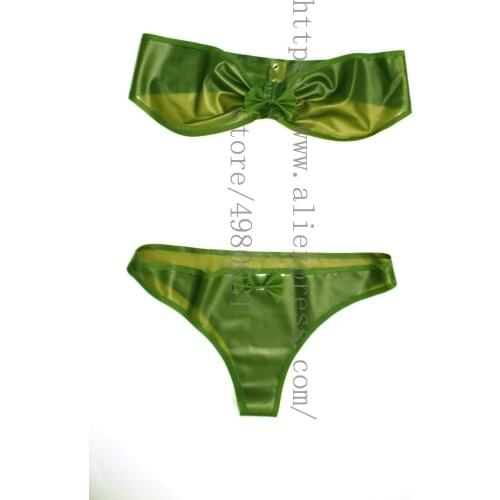 Sexy womens lingerie set including bra and briefts in transparent green color