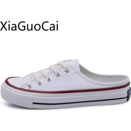 Spring and Summer New Women Flat Canvas Shoes Shallow White Ladies Flat Shoes Wild Heelless Lazy Lace Up Sneakers Shoes