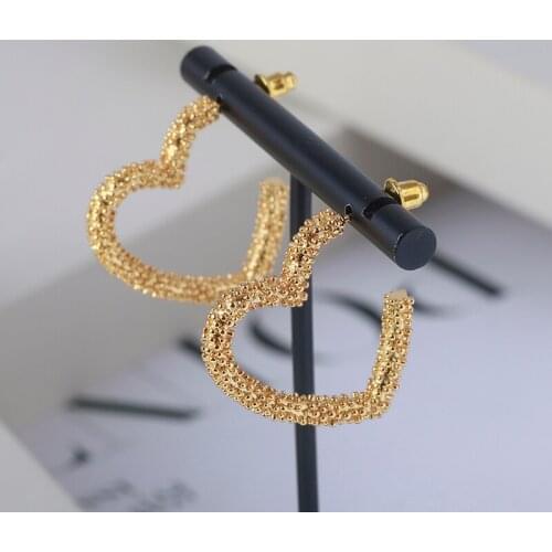 European and American girl heart simple hollowed out half open love peach heart small fresh Earrings Earrings Gift Girl