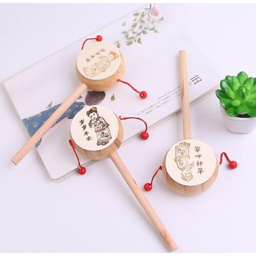 Wooden white wooden drums and rattles under the age of 20 cm 3 shake childrens traditional toy stalls and sell them wholesale
