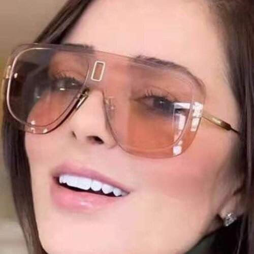 Rimless mask sunglasses women pink lenses gold metal temples